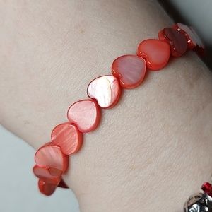 Dyed Orange River Shell heart bead bracelet